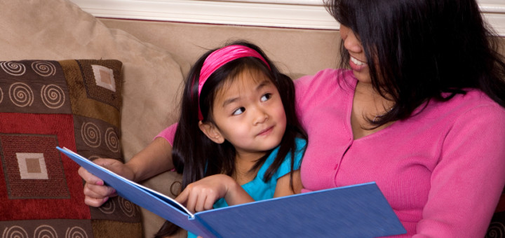 Parent reading to her child
